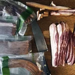 Sliced up homemade bacon